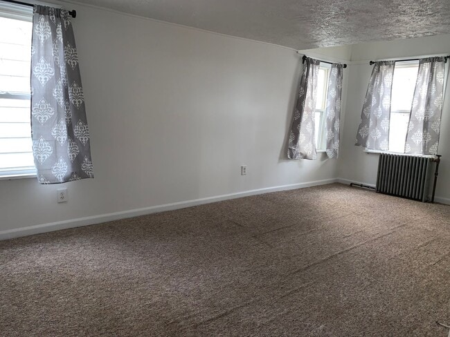 Building Photo - HEAT IS NOW INCLUDED IN THE RENT!Charming 2-Bedroom, 1-Bath Single-Family Home in the Borough of ...