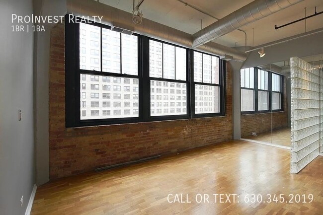 Building Photo - Available Now! Sprawling Sun-drenched 1Bed...