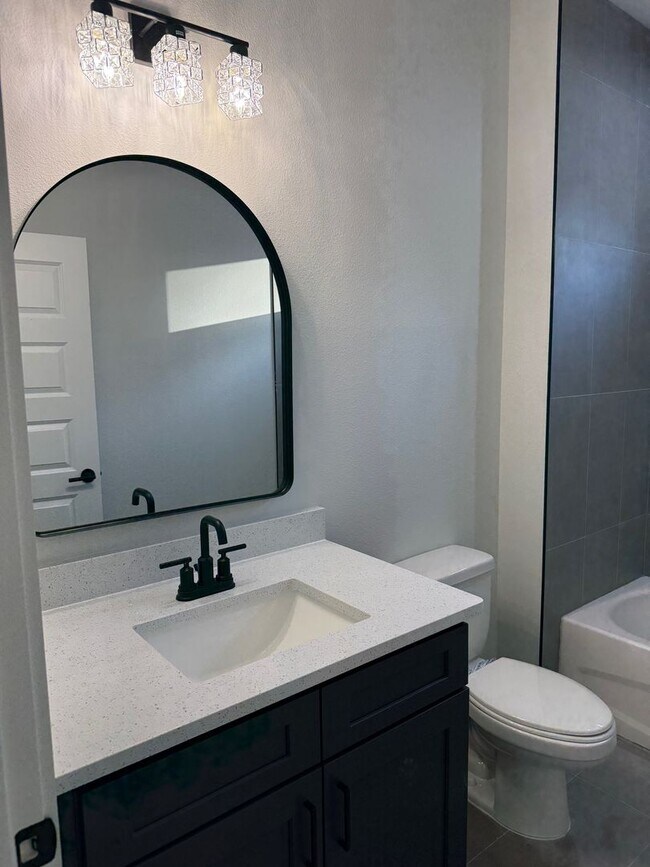 Building Photo - Brand new 3/2/2 with fenced in yard and a screened in porch!