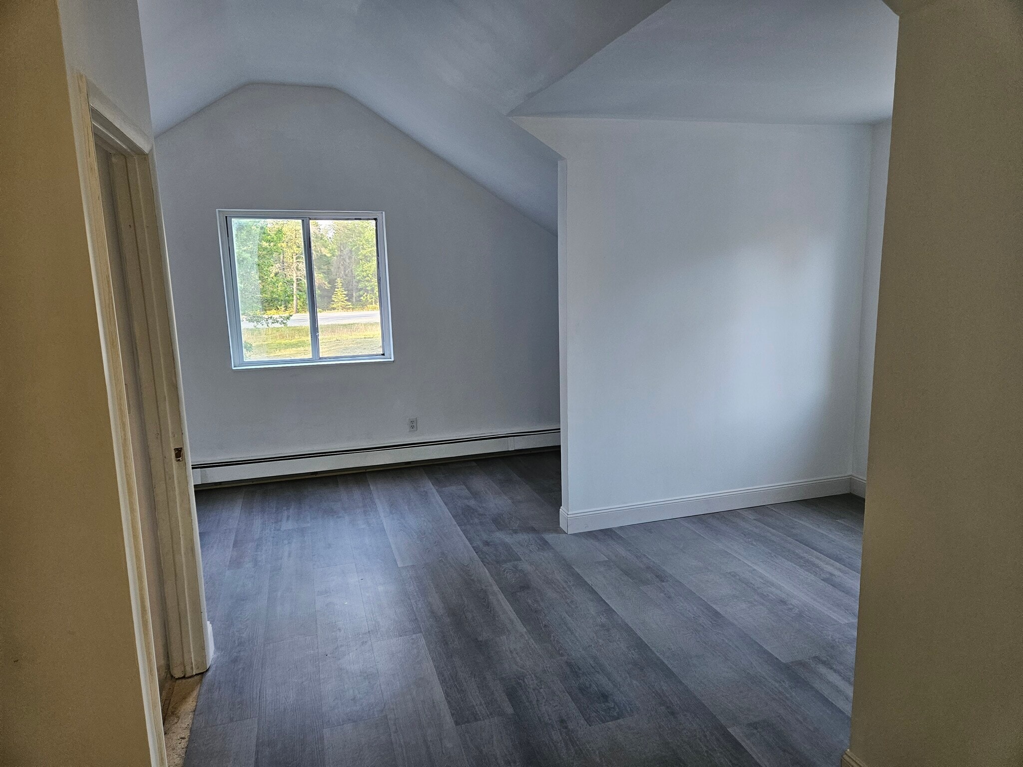 The upstairs bedroom has a huge open floor plan and vaulted ceilings - 4304 Kateri Ln