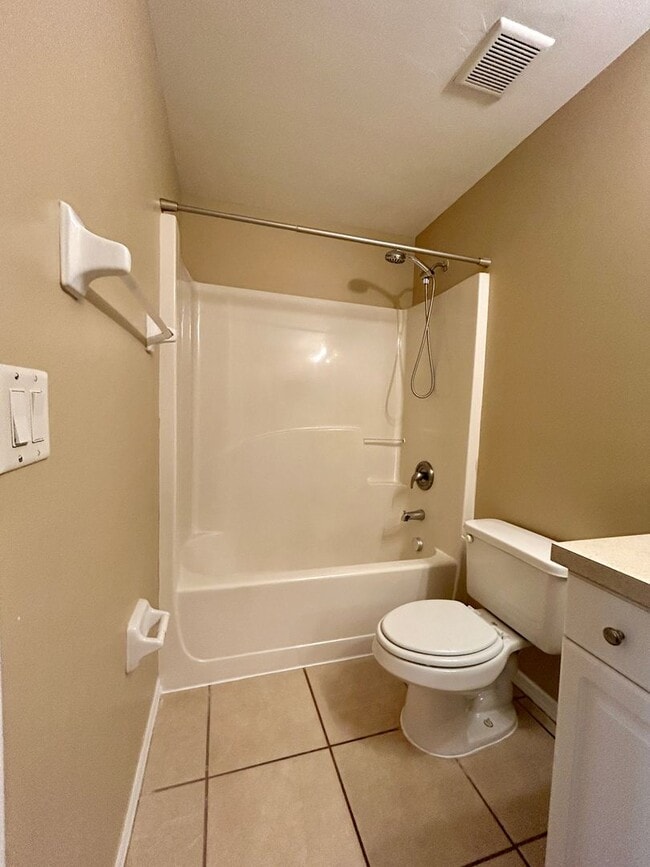 Building Photo - Charming 3BR/2BA Lehigh Acres Duplex with 1-Car Garage | Lawn Care & Salt Service Included