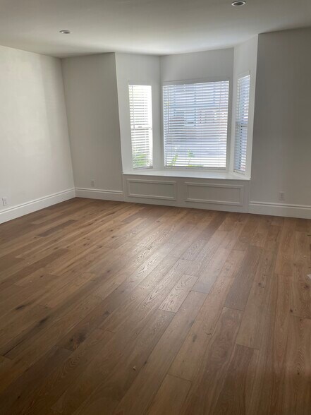 Large Main living room facing front of house... - 2220 Curtis Ave