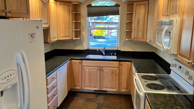 Building Photo - Large home with garage and fenced backyard