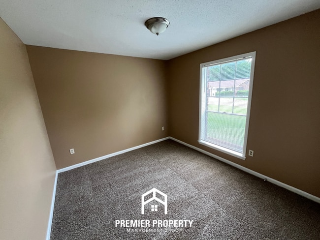 Building Photo - Spacious 4BR/2BA Whitehaven Home | 1,701 Sq Ft, Brick Fireplace & Quiet Cove