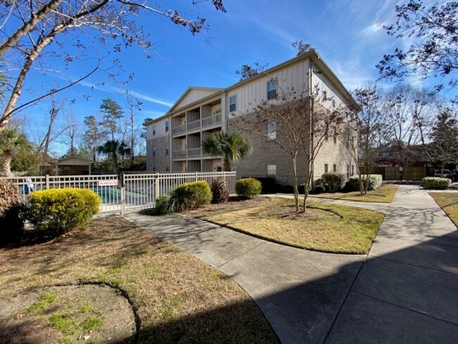 Building Photo - Welcome to this stunning 1st floor condo l...