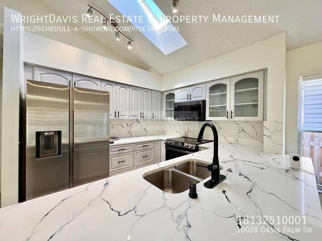 Building Photo - 10028 Oasis Palm Dr