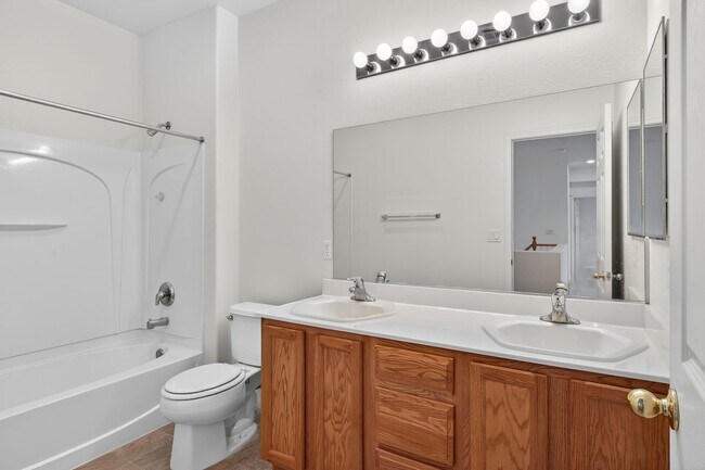 Building Photo - CORNER LOT 4-BEDROOM HOME + LOFT  WITH 3.5 BATHS AND 3-CAR GARAGE!