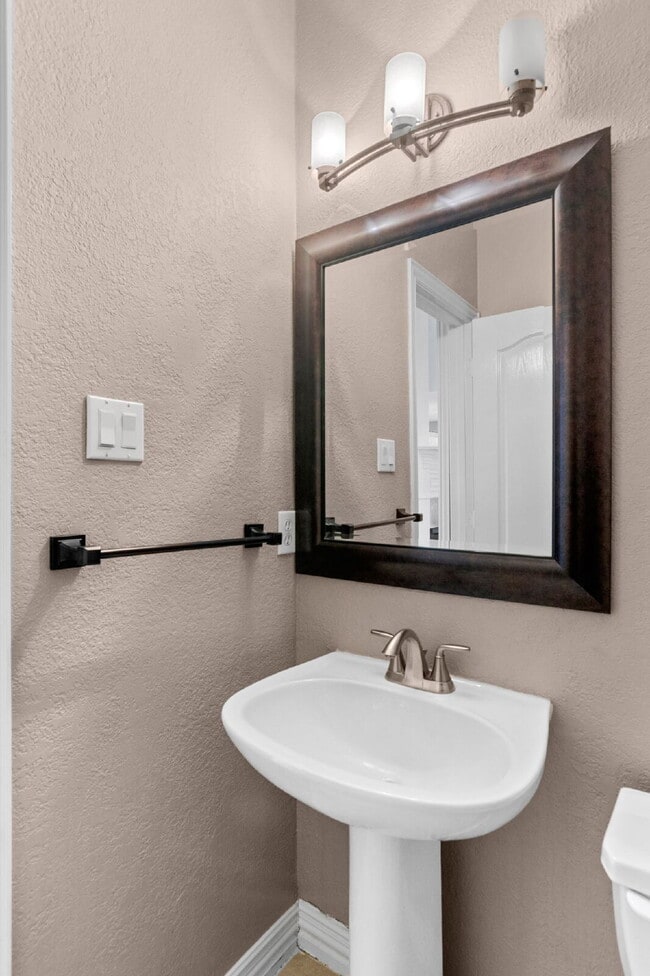 Building Photo - "Beautiful 4-Bedroom Home with Expansive D...