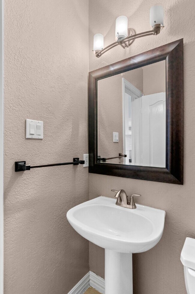 Building Photo - "Beautiful 4-Bedroom Home with Expansive Deck and Spacious Living Areas!"