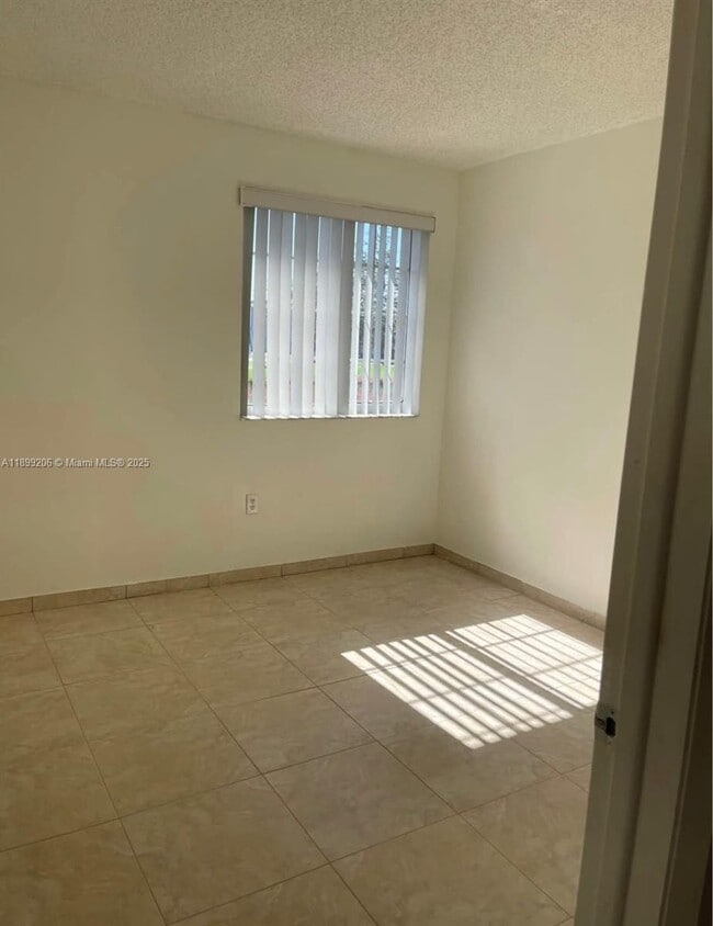 Building Photo - 5220 NW 109th Ave