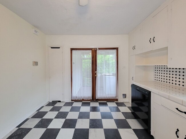 Building Photo - Step into your new home nestled in the vib...