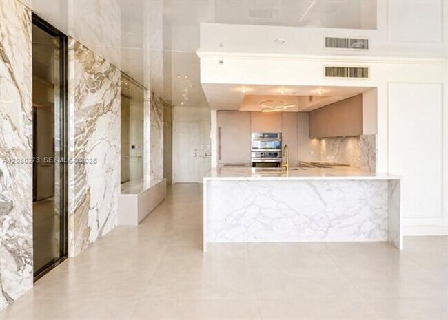Building Photo - 16699 Collins Ave