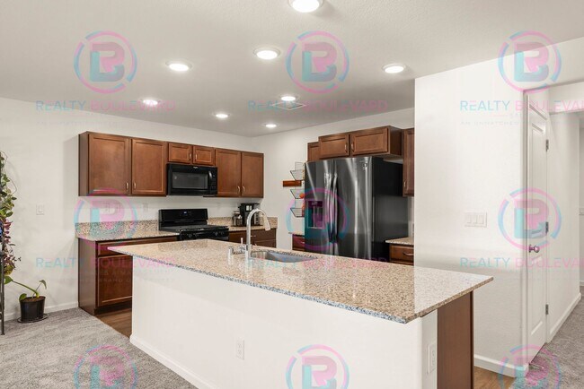 Building Photo - Spacious 4-Bedroom Lemon Valley Home with ...