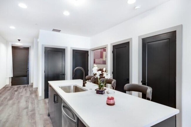 Building Photo - Modern Living Meets Walkable City Charm in...