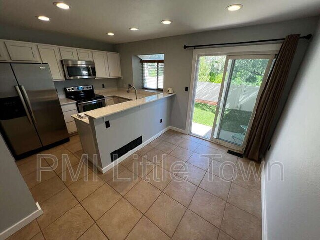 Building Photo - 9673 W Chatfield Ave