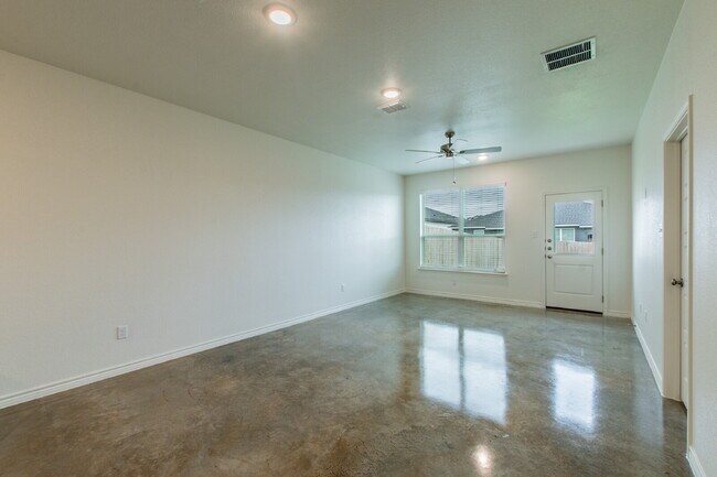 Building Photo - Brand New 3BR Duplex with Modern Concrete Floors & Fenced Yard!