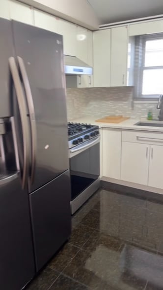 Building Photo - 217427-217438 38th Ave