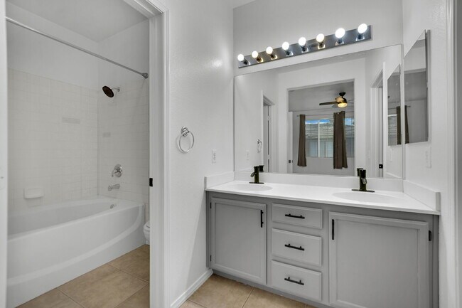 Building Photo - Beautiful 3-bedroom, 2-bathroom condo located in the gated community of The Legends, just minutes...