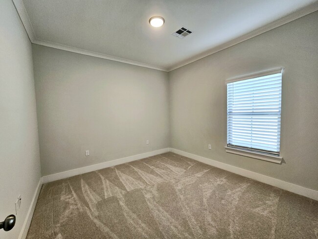 Building Photo - Stunning 4-Bedroom Waterfront Home with Granite Countertops and Hardwood Floors in The Sanctuary ...