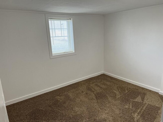 Building Photo - 9050 S 19th Ave