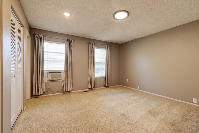 Building Photo - Spacious 4-Bedroom Home with Private Backy...