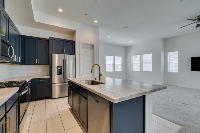 Building Photo - Stunning 4-Level Townhome in Inspirada | R...