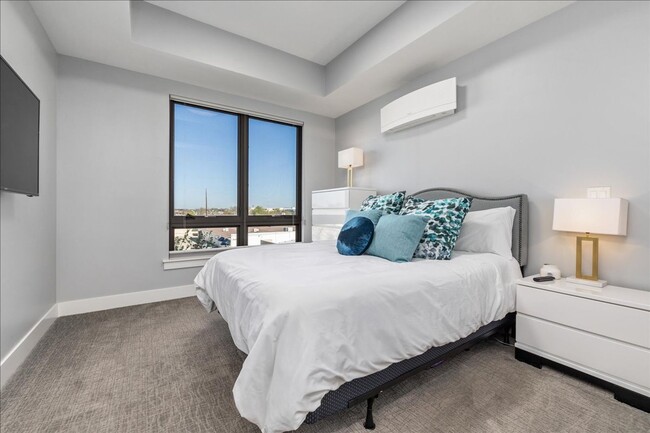 Building Photo - COME HOME TO REFINED DOWNTOWN LUXURY CONDO...