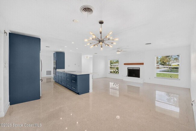 Building Photo - Welcome to this beautifully remodeled 4-bedroom, 3-bath home in the heart of Indialantic Beach!