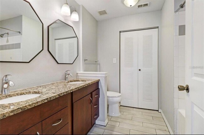 Building Photo - 9506 Lake Chase Island Way