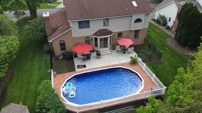 Building Photo - Up to 7 guests can stay and enjoy the pool