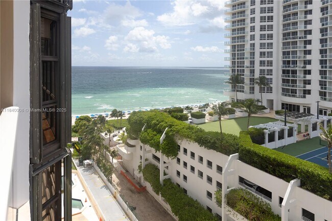 Building Photo - 6423 Collins Ave