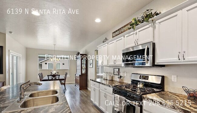 Building Photo - 6139 N Santa Rita Ave