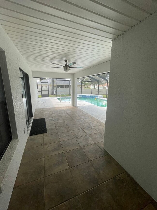 Building Photo - Spacious 4-Bedroom Pool Home – 2 Primary S...