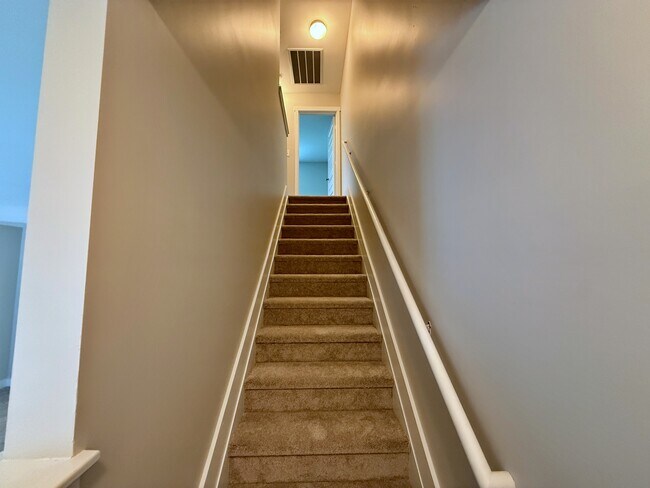 All new carpet and paint throughout the unit. - 3010 Bellflower Cir