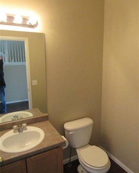 Main level half bath. - 7334 Pearly Heath Rd