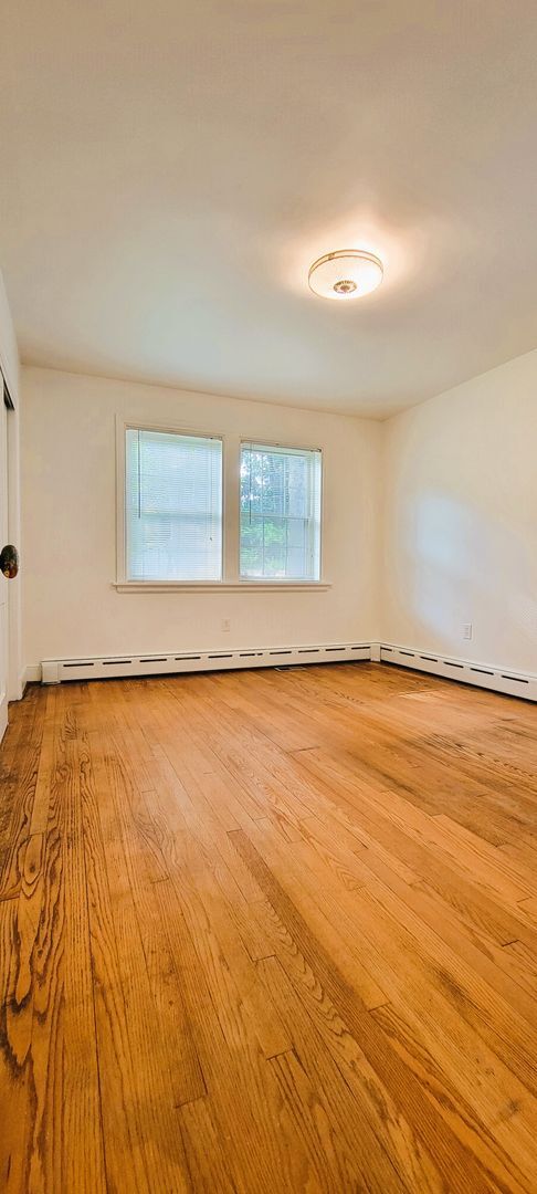 Building Photo - Remodeled brick bungalow with 1st floor li...
