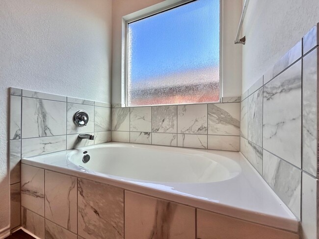 Building Photo - Spacious 4/BR 2.5/BA Two-Level Home with 3-Car Garage & Covered Deck