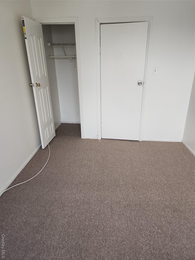 Building Photo - 205-11 Hollis Ave