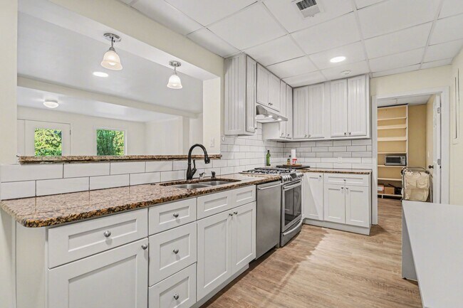 Building Photo - Two Levels. Two Kitchens. One Pool. East Cobb at $5,495/month