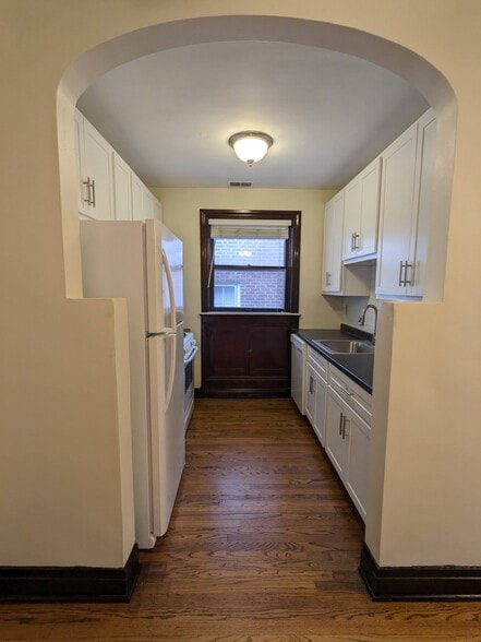 Kitchen through archway - 6633 Alamo Avenue