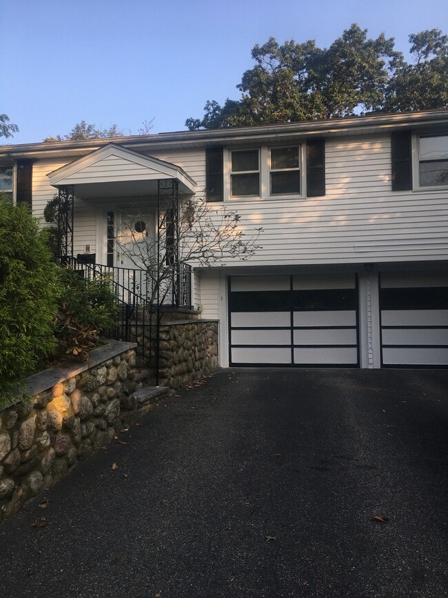 Front of House. Driveway and 2 Bay Garage - 71 Morningside Dr