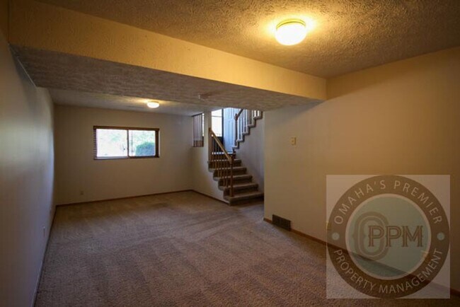 Building Photo - $500.00 off the Deposit Cul-de-Sac Comfort! 3-Bed Omaha Home with Huge Deck and Patio.