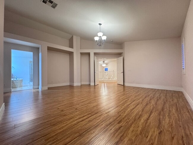 Building Photo - LUXURY LIVING • GOLF COURSE VIEW • GUARD-GATED COMMUNITY