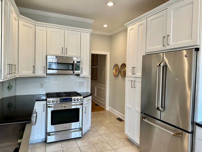 Building Photo - SPACIOUS 3 BED BROWNSTONE with PARKING, YARD and 2 DECKS!