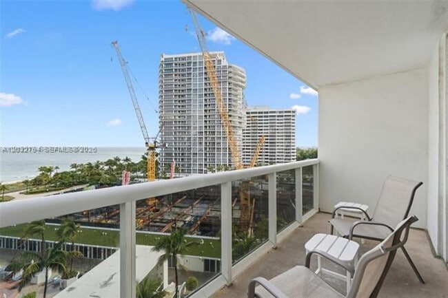 Building Photo - 10275 Collins Ave