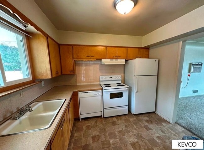 Building Photo - Massive Three Bedroom Home with Yard!