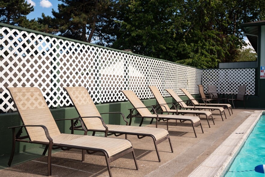 Pinewood Terrace Apartments | Pool Lounge Chairs - Pinewood Terrace