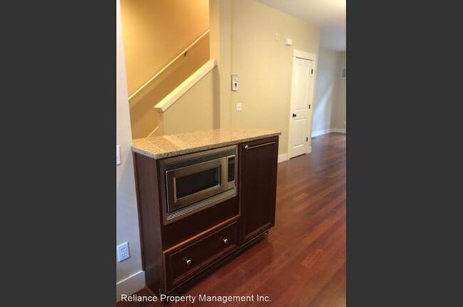 Building Photo - Stunning Tri-Level Condo with Open Concept Layout, Loft, and Private Patio!