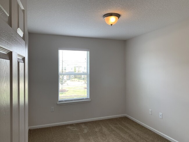 Building Photo - Moultrie Village Townhome with two ensuite bedrooms!