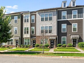 Building Photo - The Towns on Greenway! Two bedrooms. Two private baths, Half Bath. Greenway around the corner. Up...